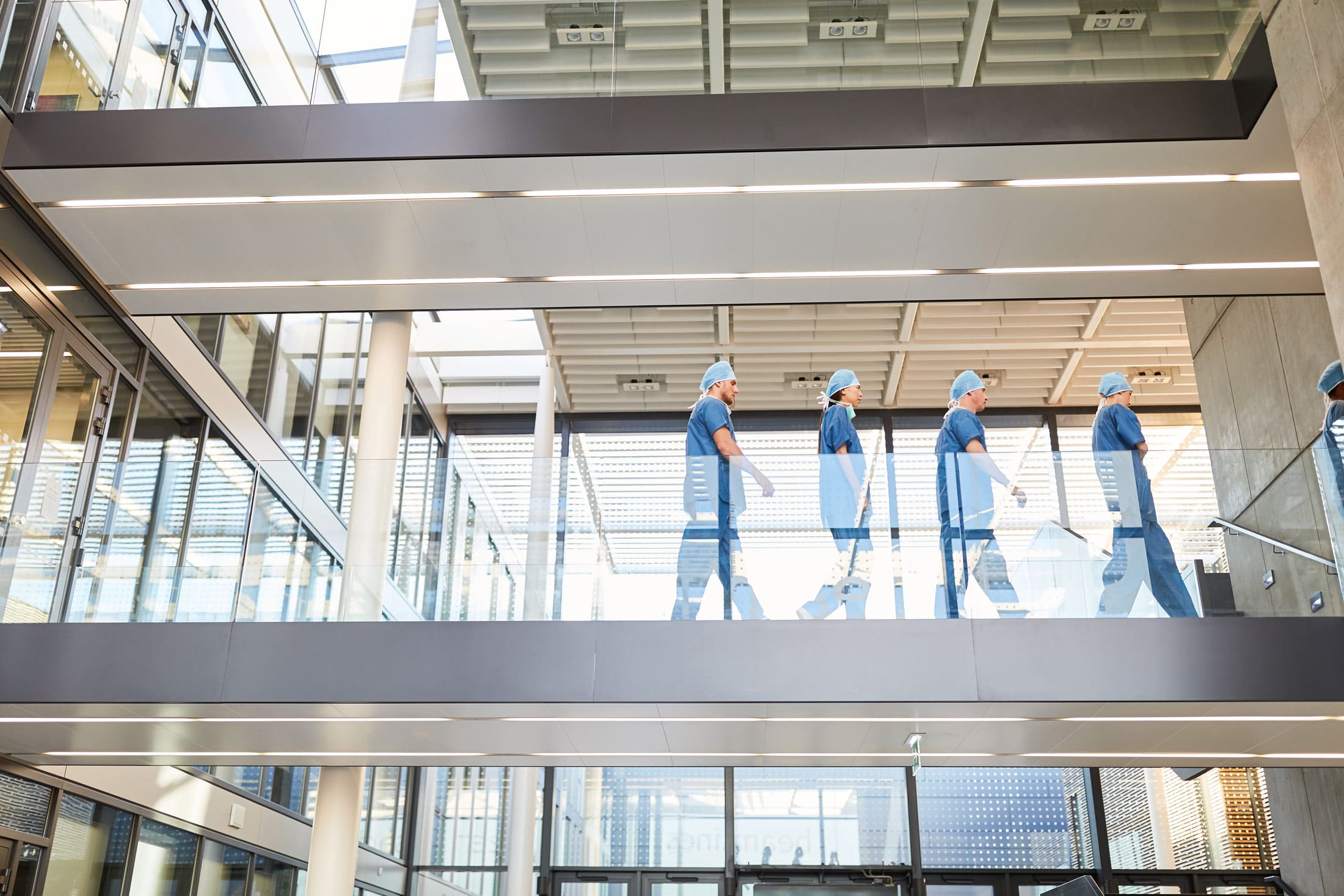 Freestone Strategies Healthcare Pr Expertise Group Of Surgeons In The Stairway Of The Hospital